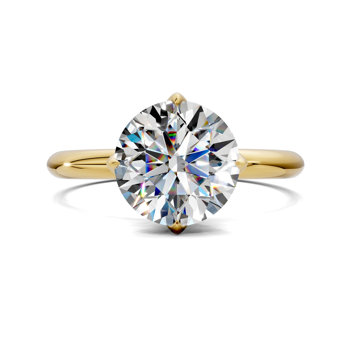 Yellow gold solitaire engagement ring with round lab diamond center and slim band
