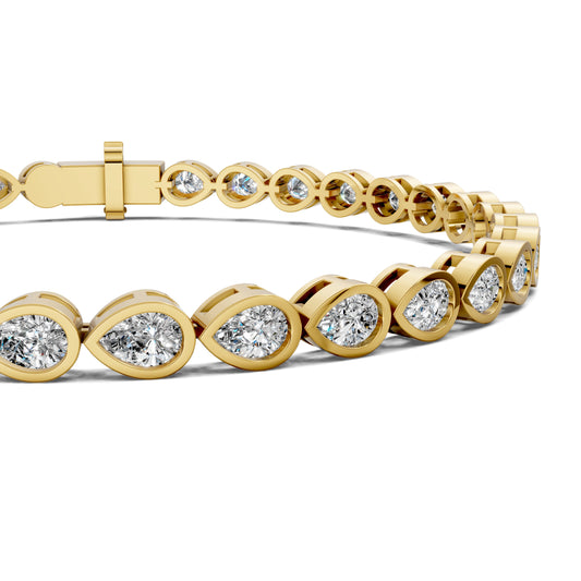 5 carat pear cut lab grown diamond bezel bracelet in gold by Opes & Co