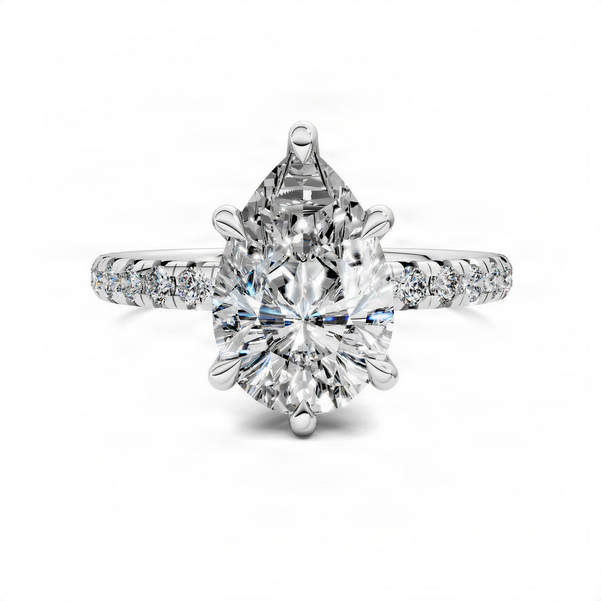 Pear-cut diamond pavé ring with scalloped band in white metal