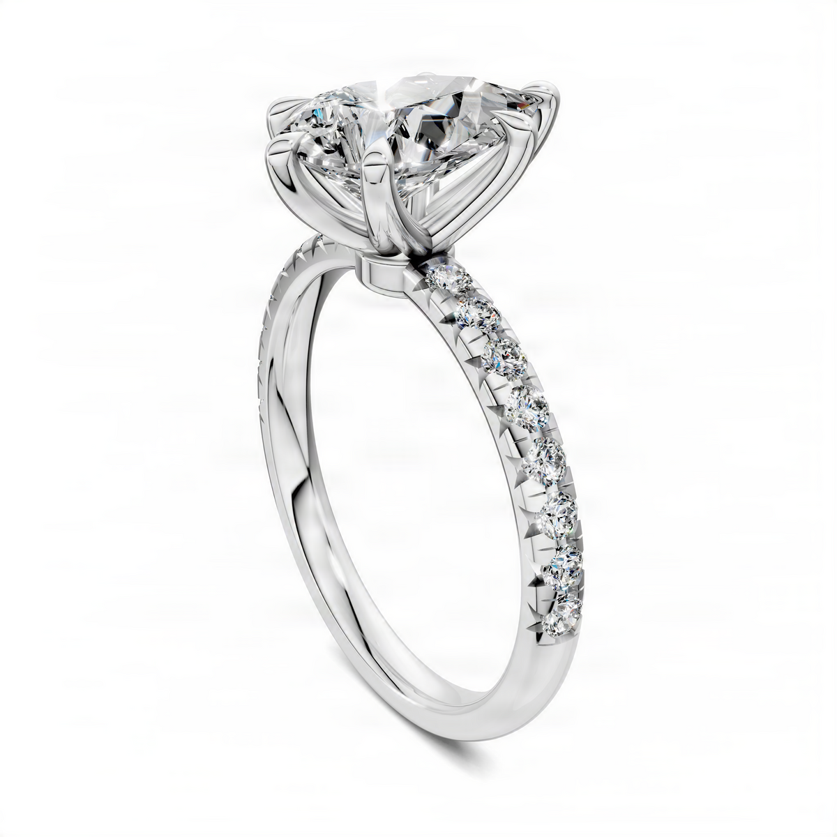 Pear-cut pavé engagement ring with scalloped band in white metal
