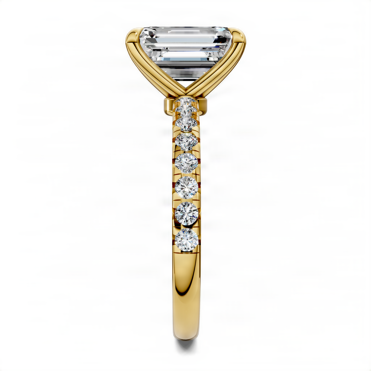 Emerald-cut diamond ring in yellow gold with scalloped pavé band