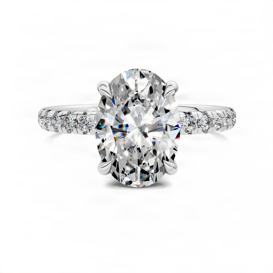 Oval scalloped pavé ring with a large oval center stone in white metal