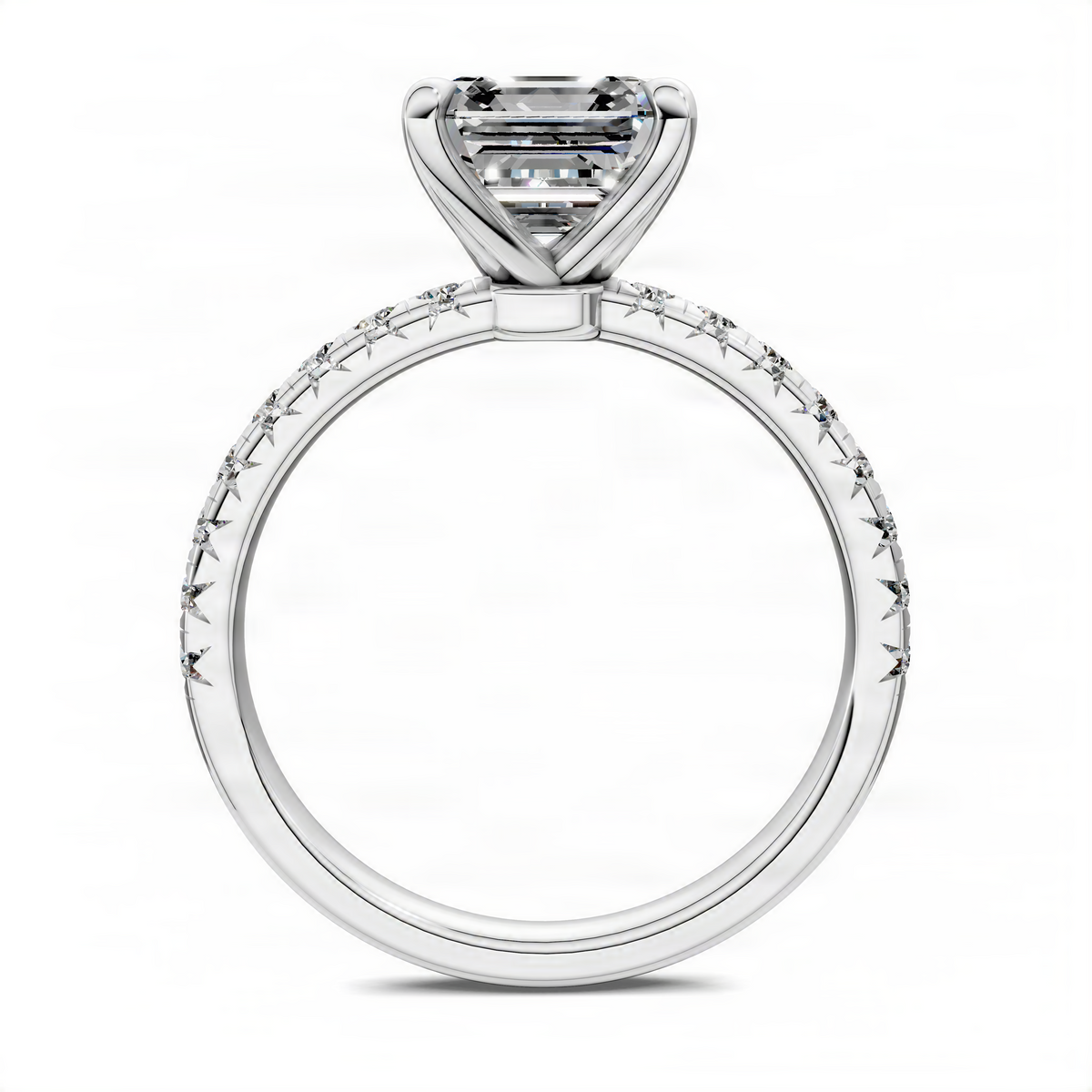 Scalloped pavé ring with round-cut center stone in white gold setting