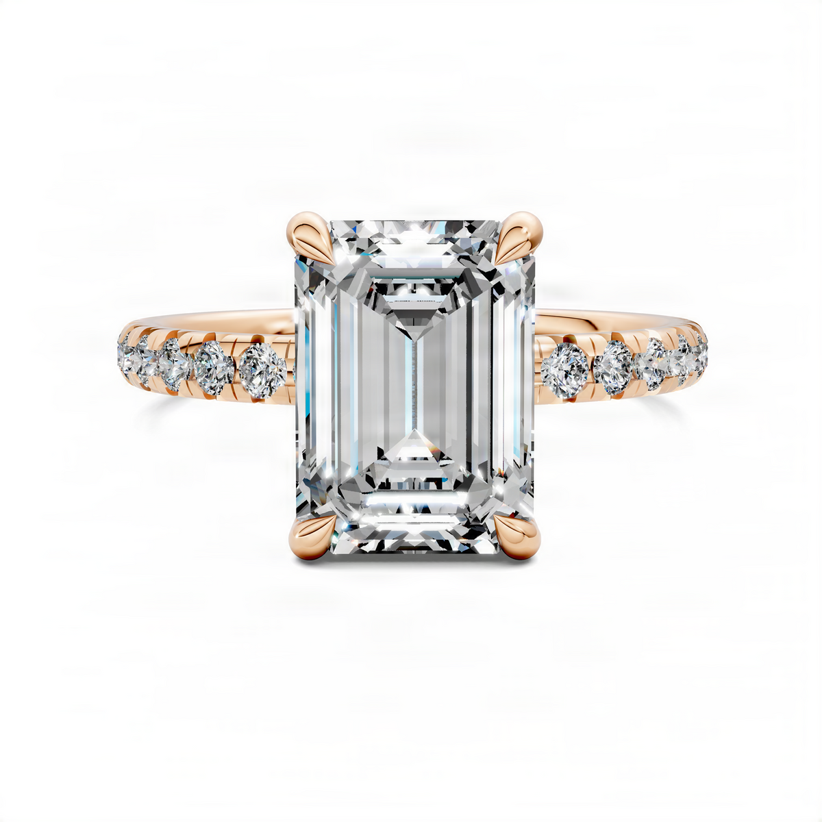Emerald-cut diamond ring with scalloped pavé band in gold