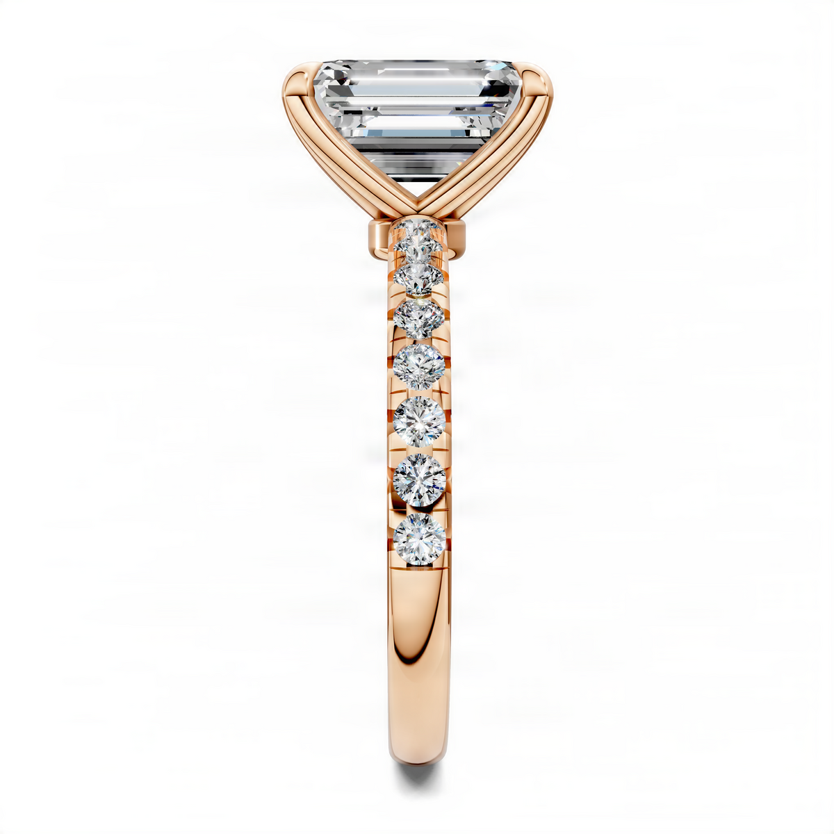 Scalloped pavé ring in rose gold with baguette center stone and round stones