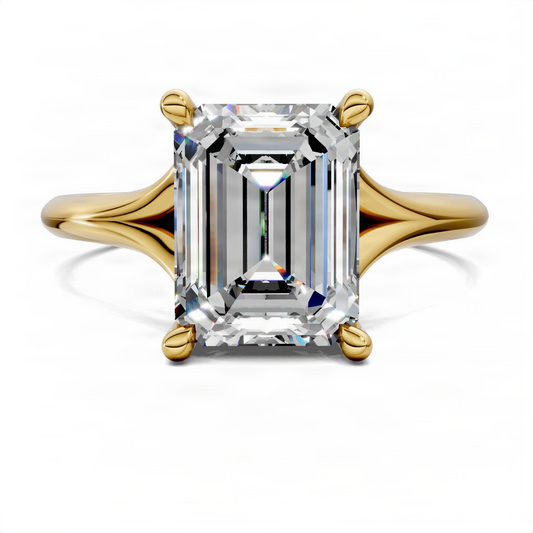 Yellow gold emerald-cut engagement ring with split shank and hidden halo