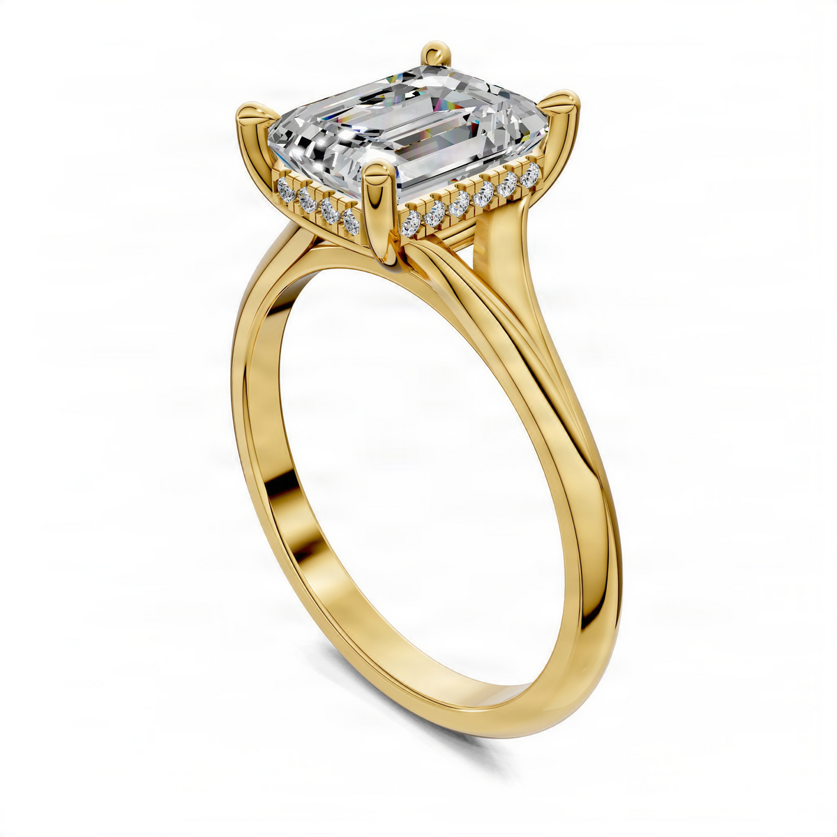 Yellow gold split-shank ring featuring emerald-cut center stone and hidden halo