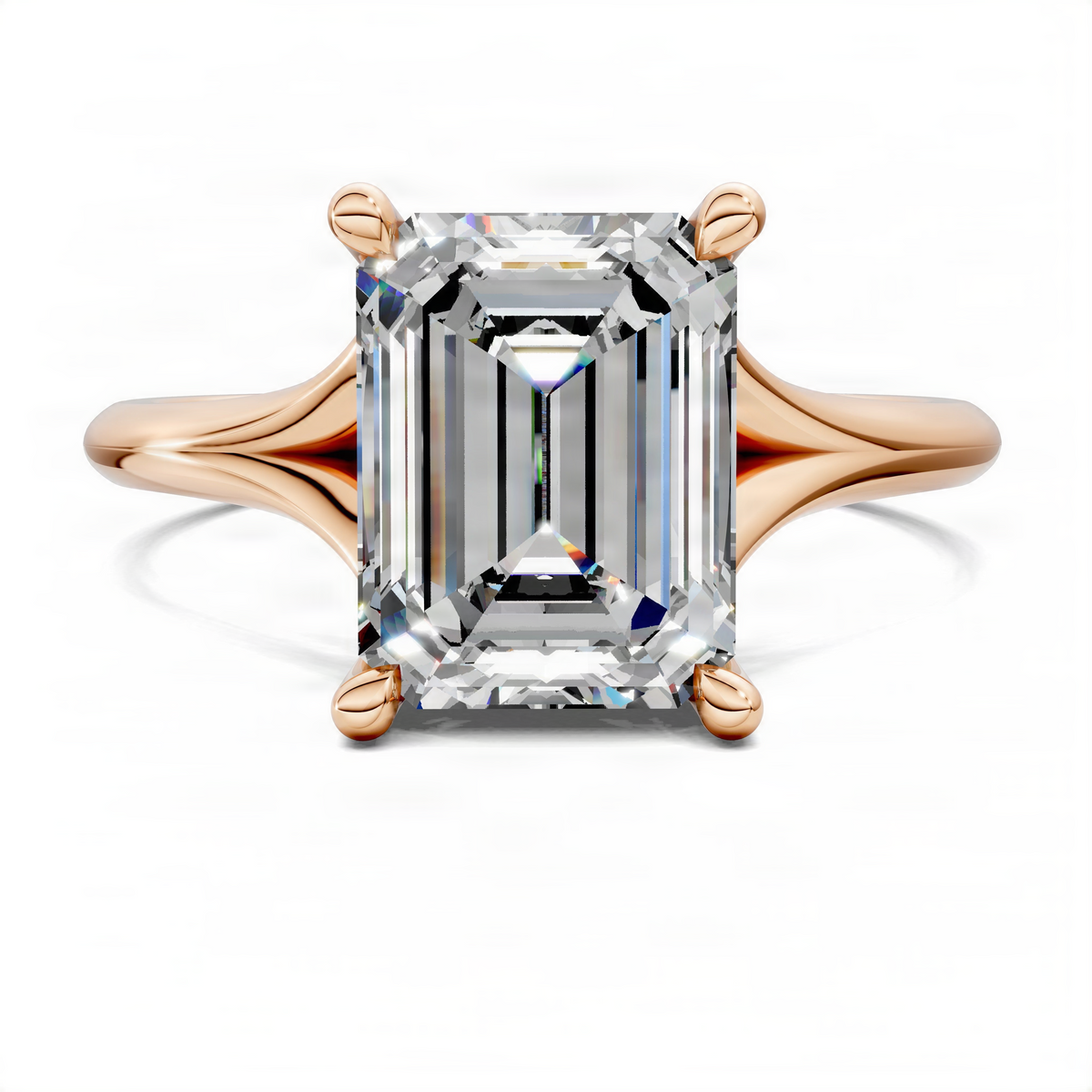 Rose gold emerald-cut engagement ring with split shank and halo around center stone