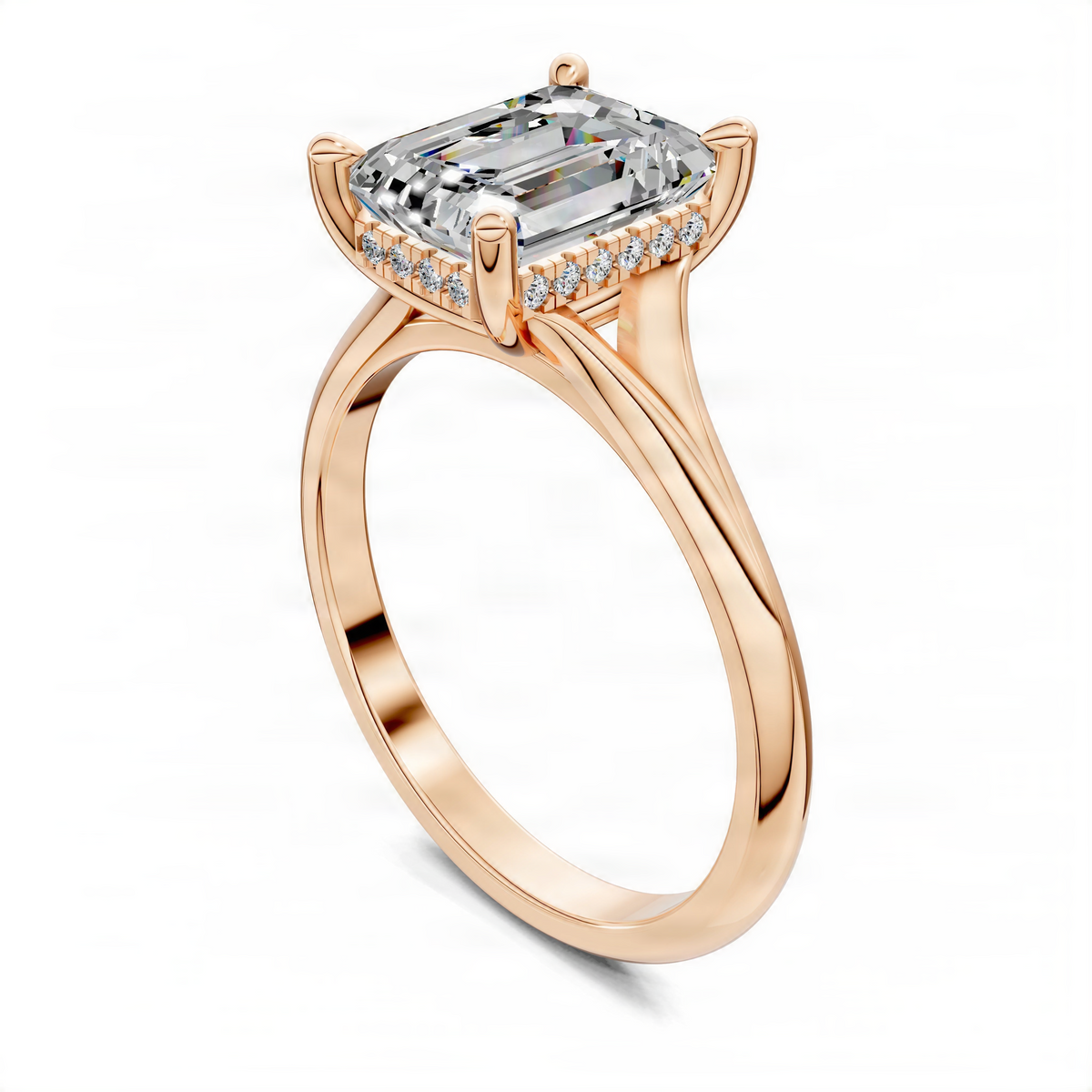 Rose gold split-shank engagement ring with emerald-cut center stone and hidden halo