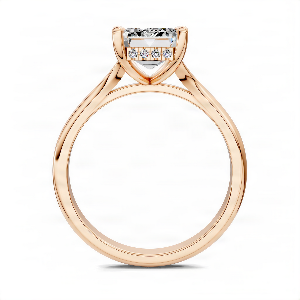 Rose gold engagement ring with emerald-cut center stone and hidden halo, front view