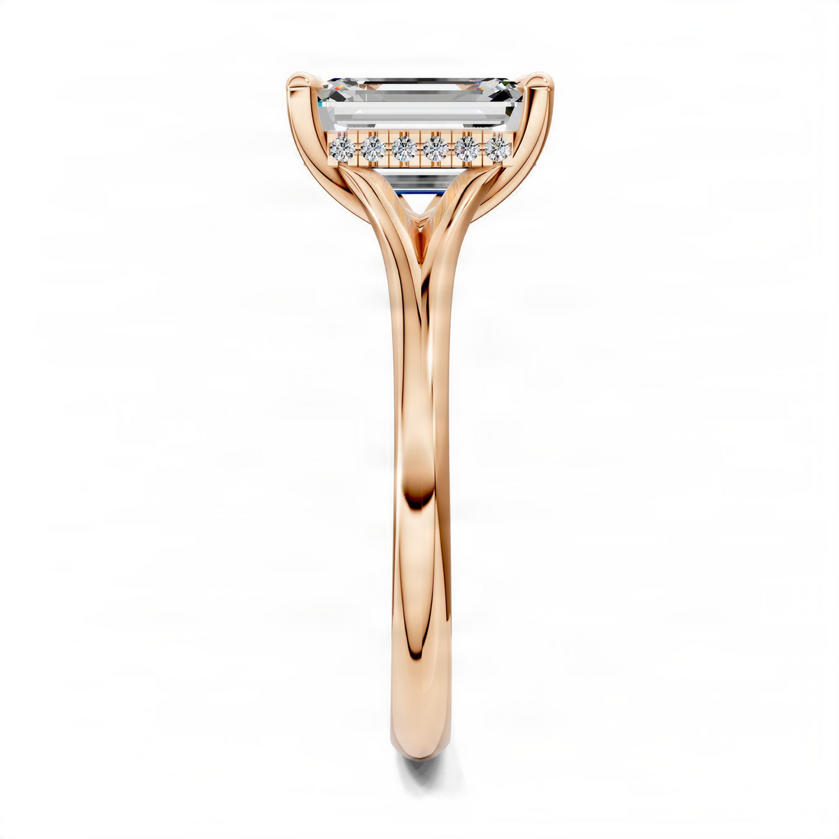 Rose gold engagement ring with emerald-cut center stone and hidden halo, split shank