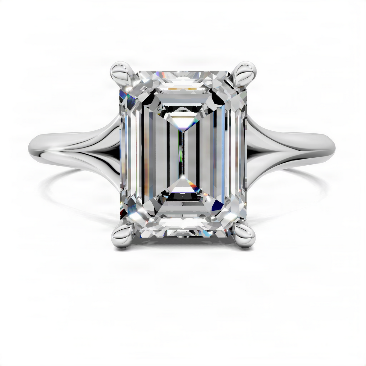 White gold emerald-cut engagement ring with split shank and hidden halo