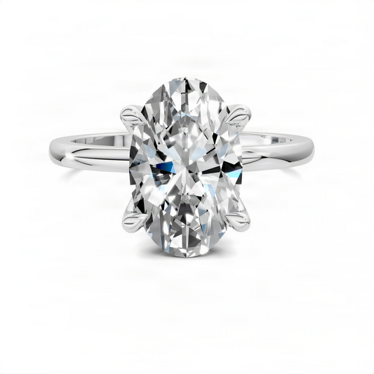 Silver oval gemstone ring with four prongs and split band, clear oval center stone