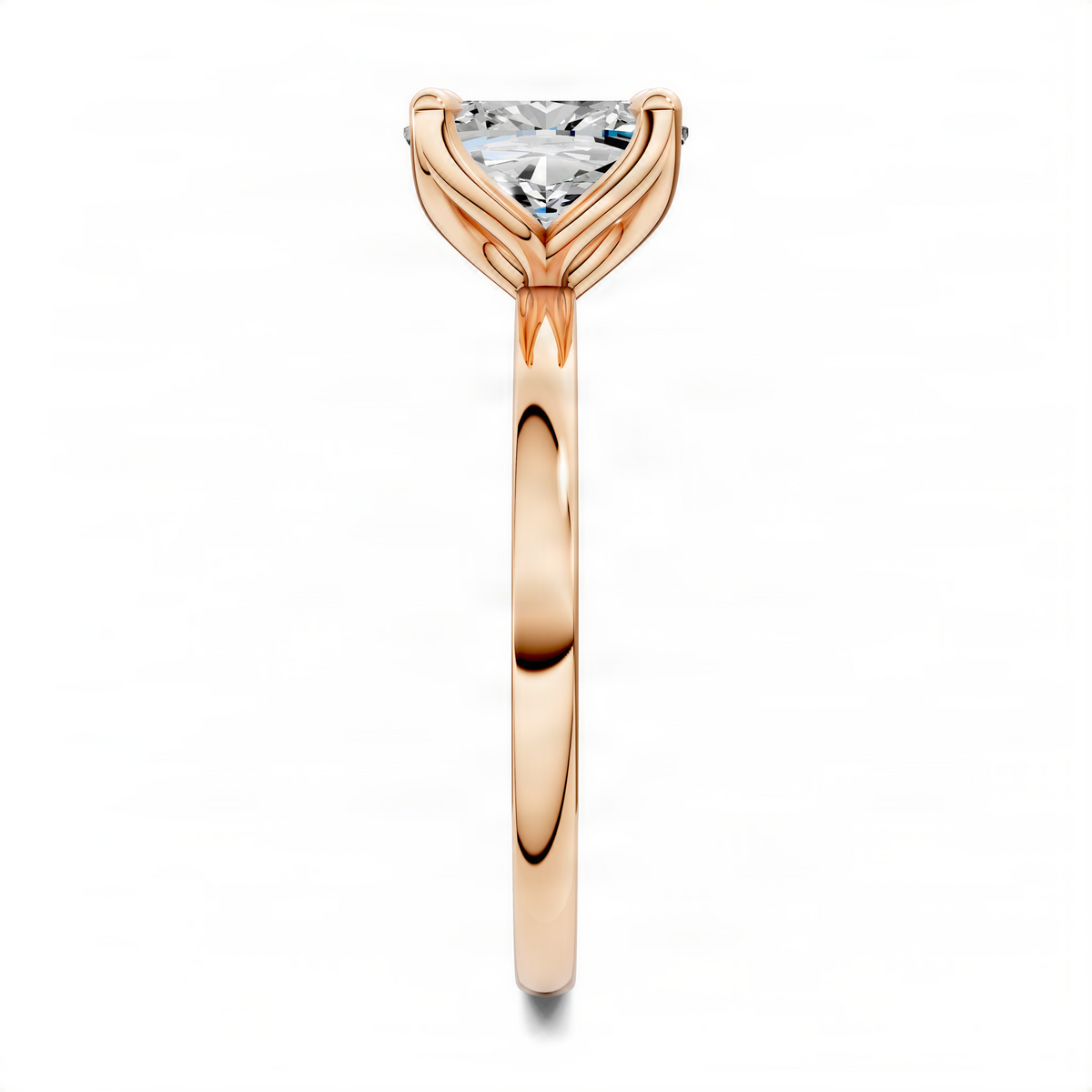 Rose-gold ring with cushion-cut gemstone and open basket prong design