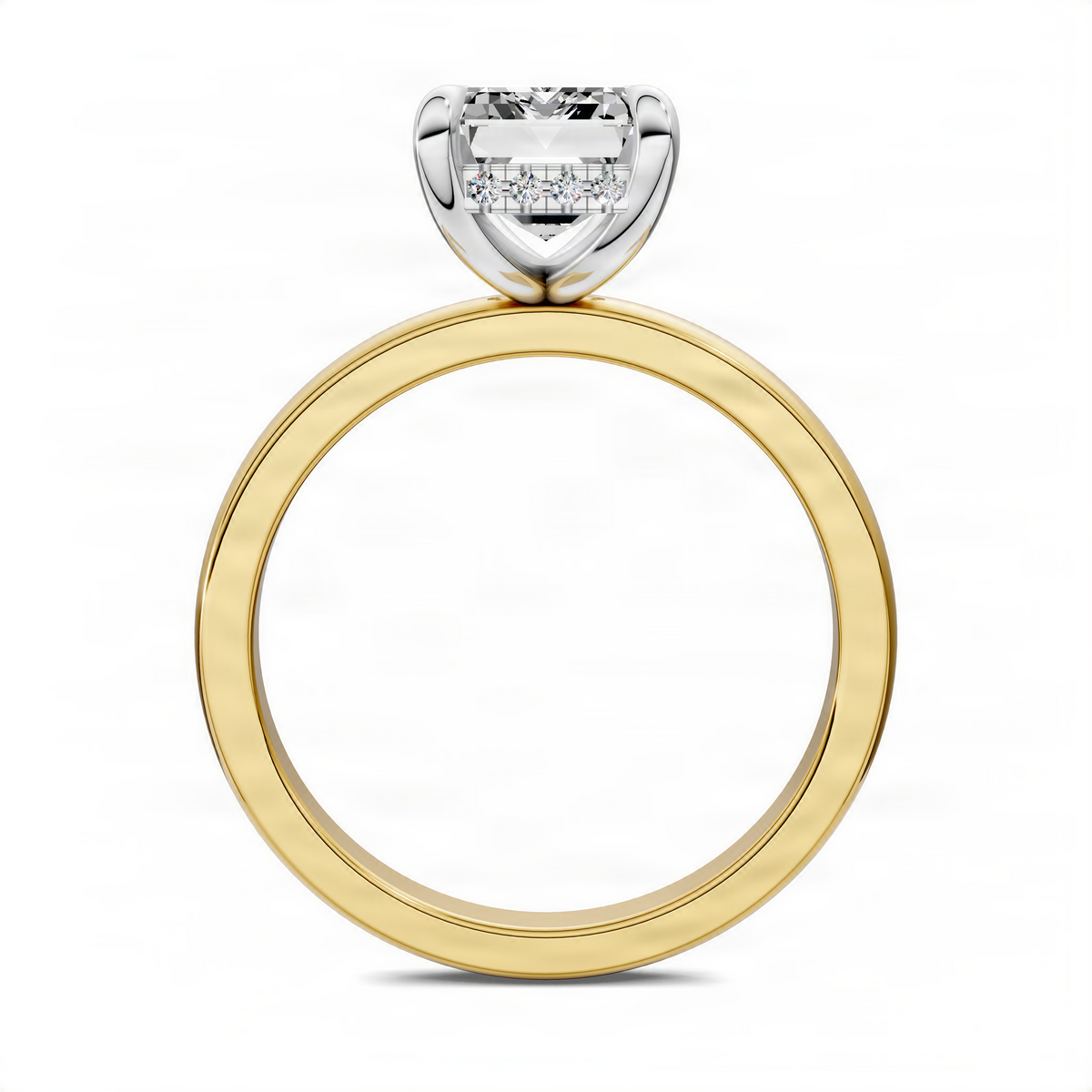 Mixed-metal ring with yellow gold band and emerald-cut center stone in white setting