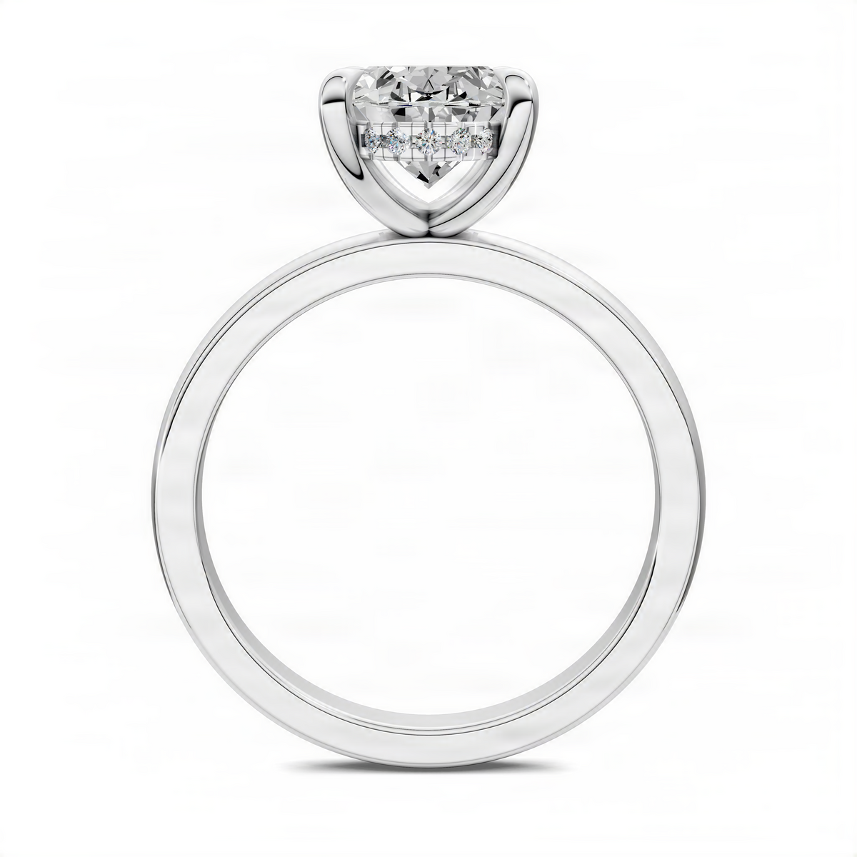 White gold ring featuring a round center diamond set in a heart-shaped halo