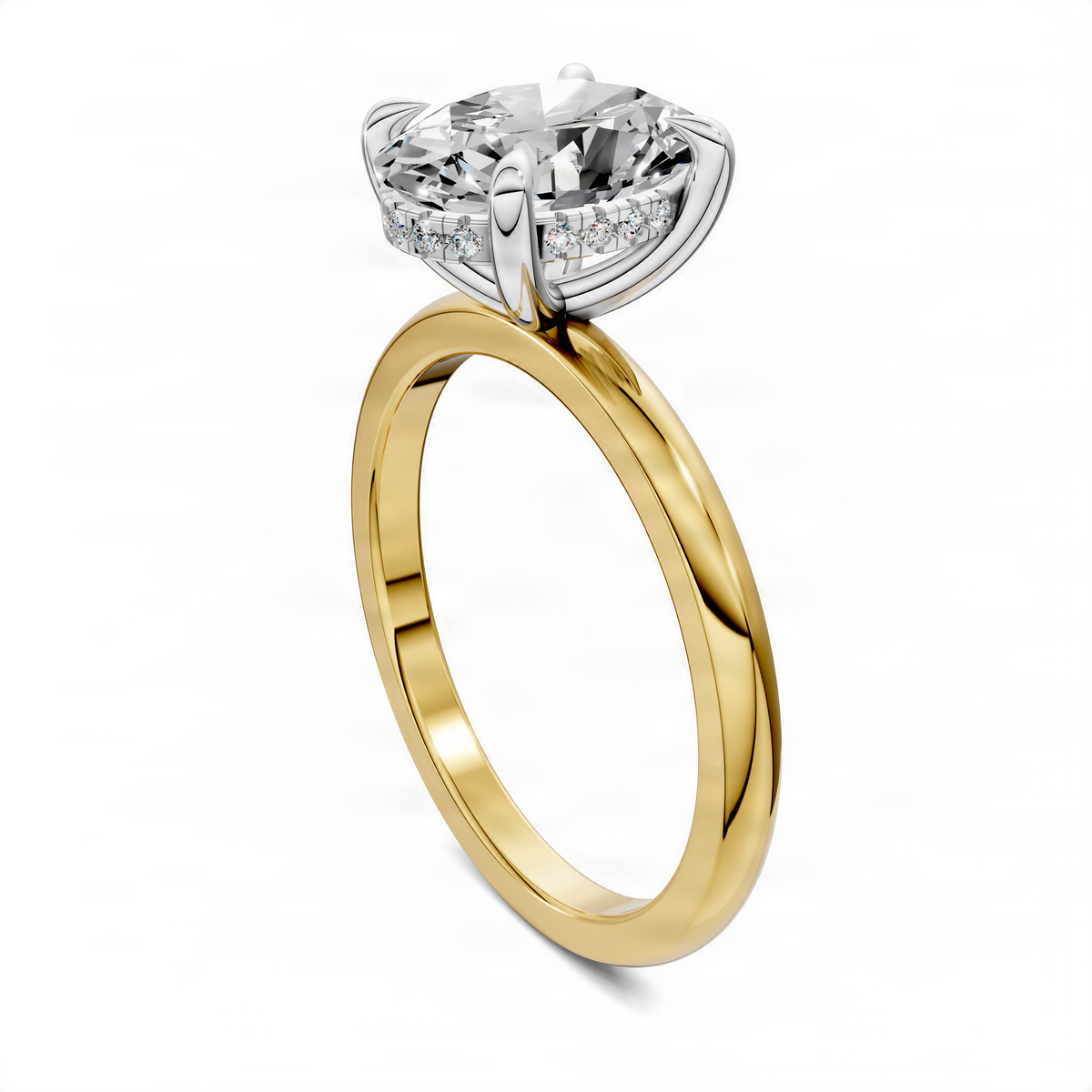 Mixed-metal ring with white prong-set round diamond on a yellow gold band