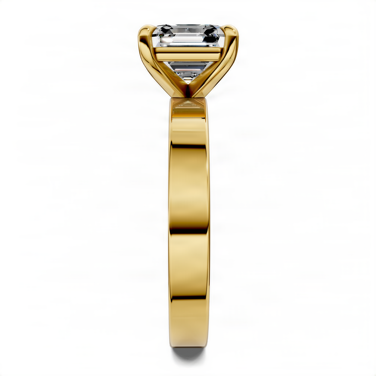 Yellow gold solitaire ring with rectangular baguette-cut center stone
