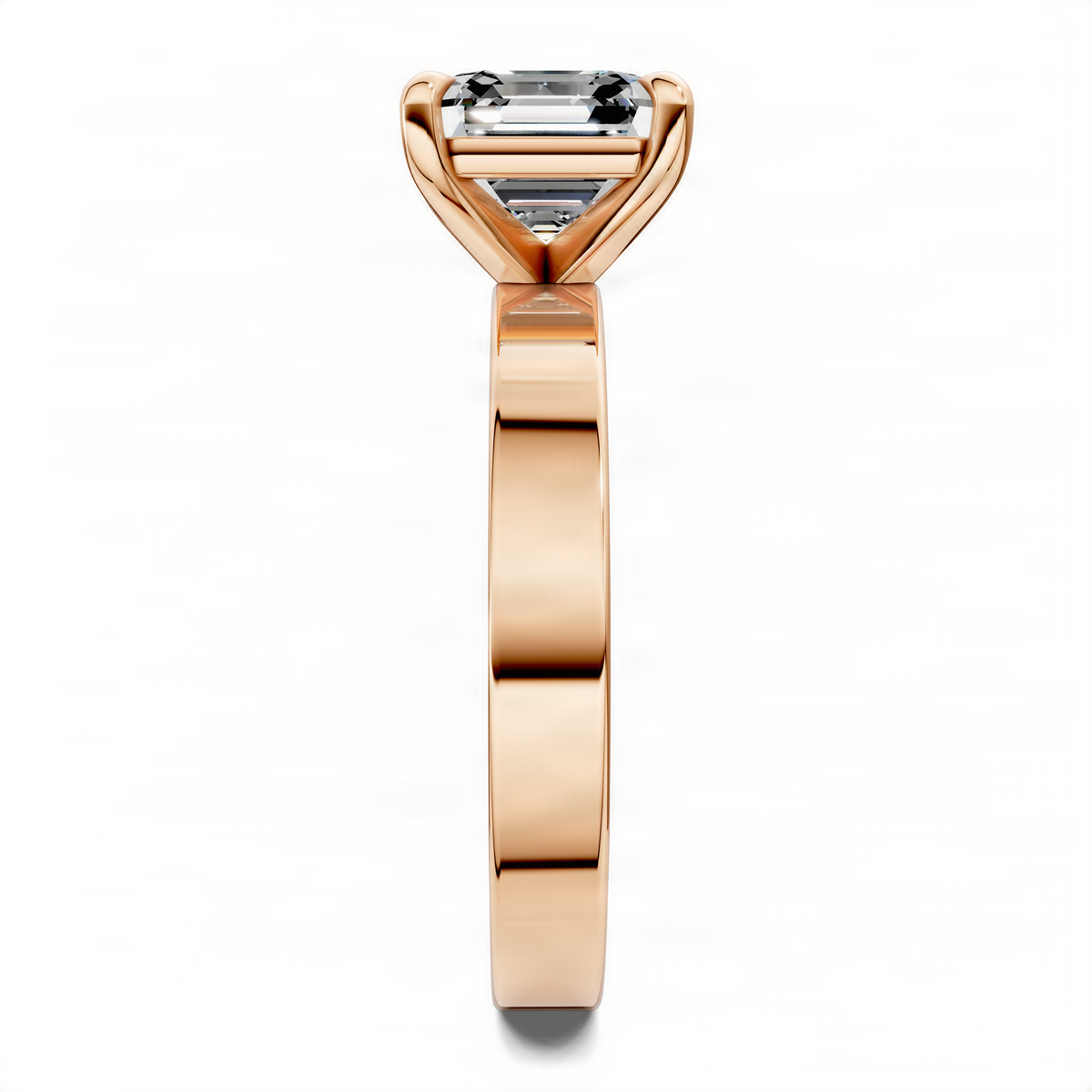 Rose gold solitaire ring with rectangular baguette-cut center stone
