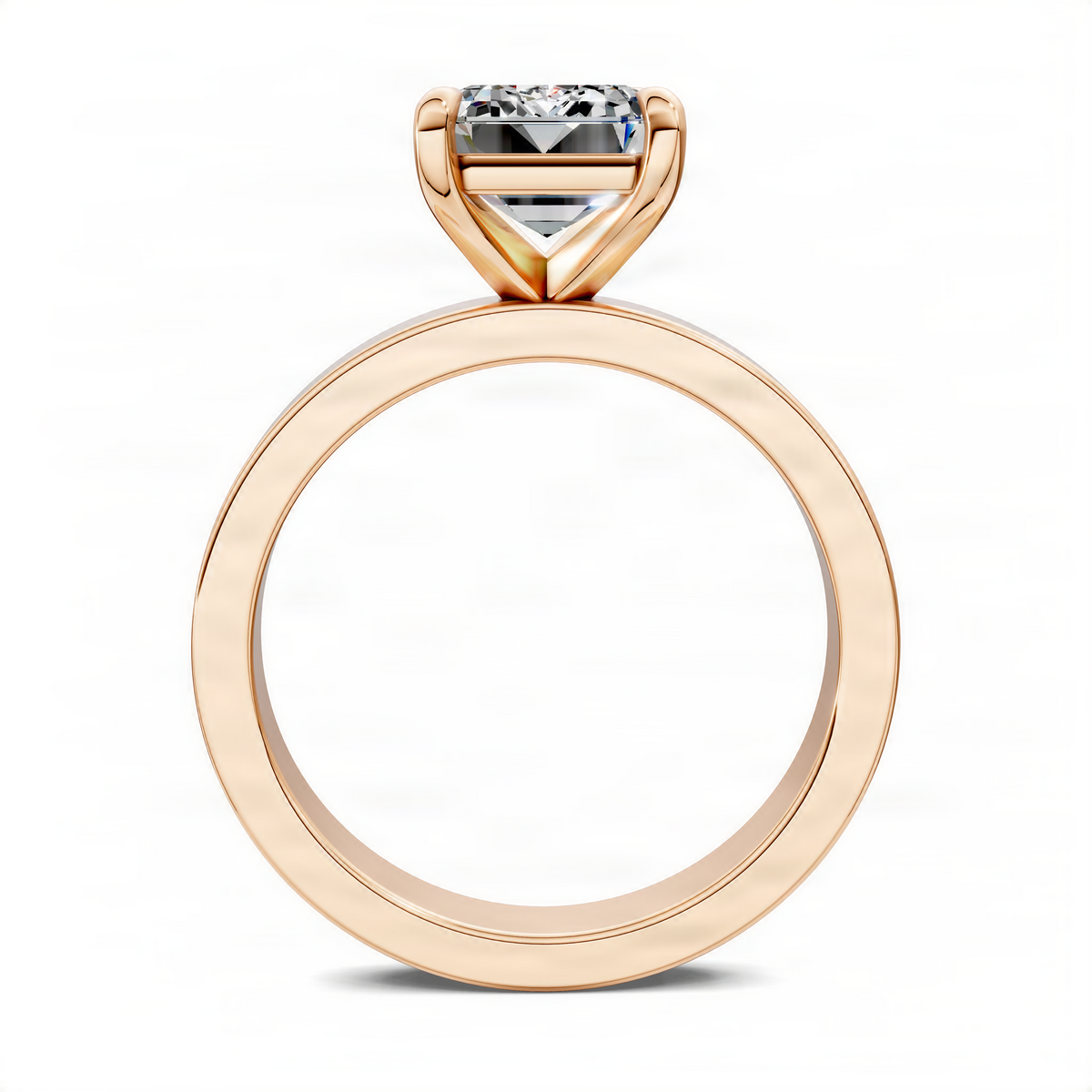 Rose gold solitaire engagement ring, side view with rectangular stone and slim band