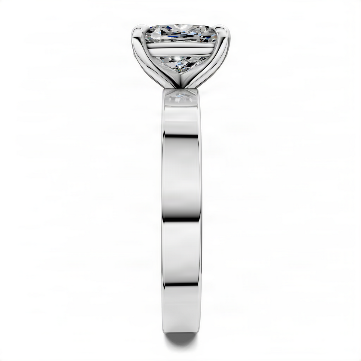 White gold solitaire ring with cushion-cut diamond and claw prongs