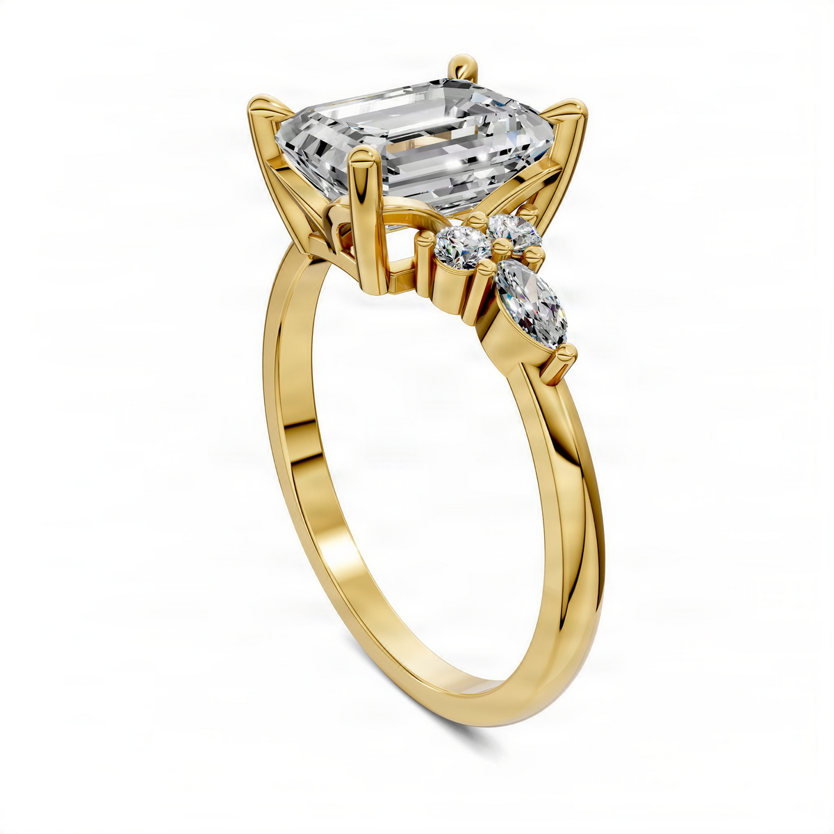 Yellow gold engagement ring with emerald-cut center stone and pear-shaped side stones