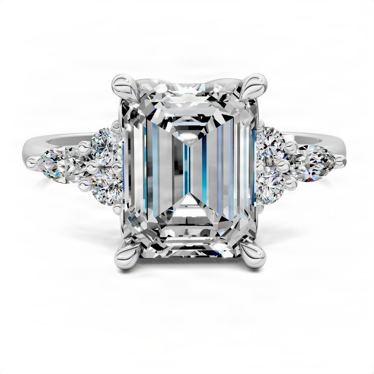 White metal engagement ring with large emerald-cut center stone and side diamonds