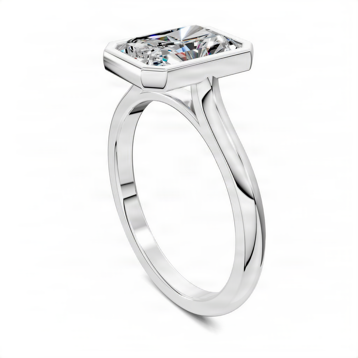 White gold radiant-cut solitaire ring with cathedral bezel set center stone