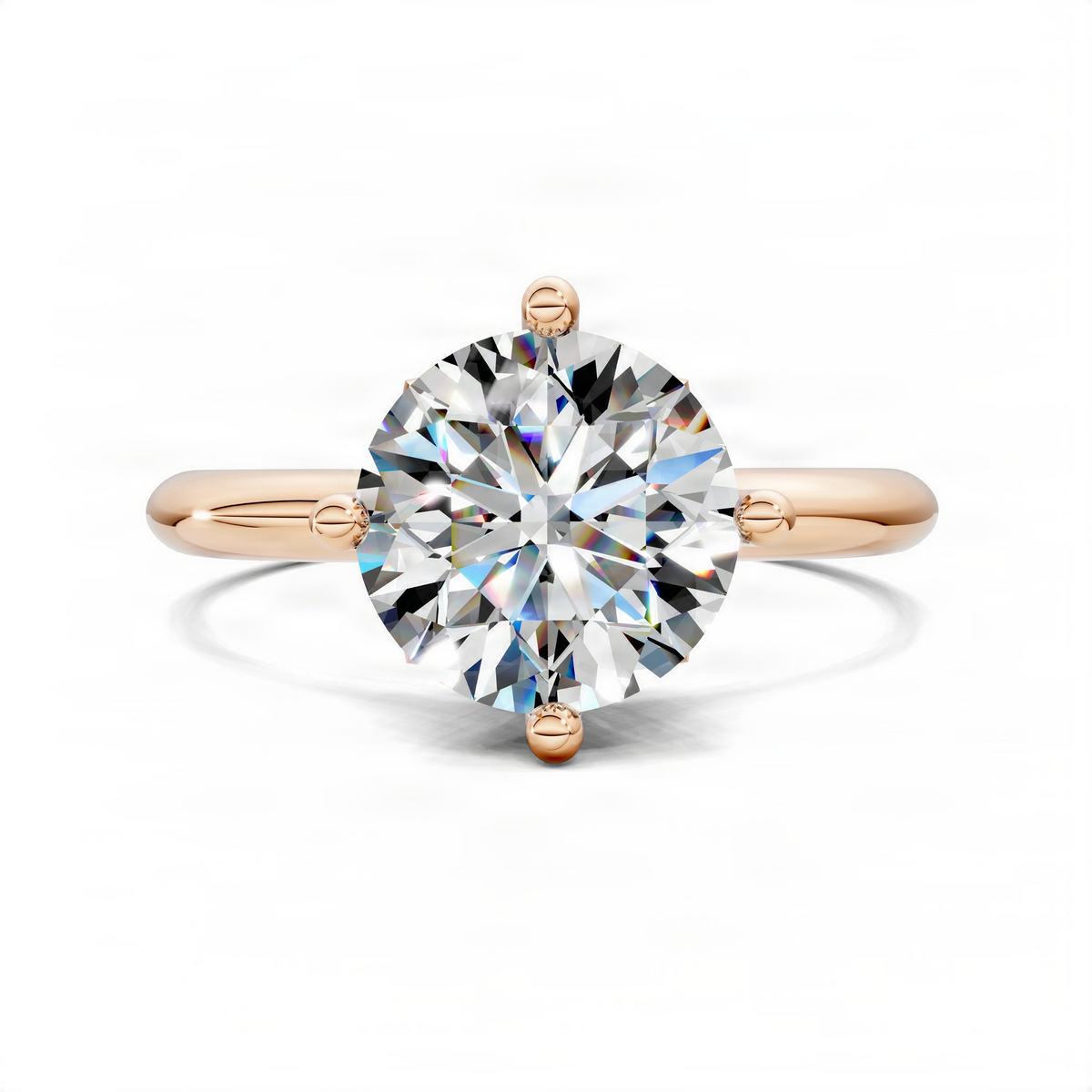 Rose gold round solitaire engagement ring, top view with petal crown prongs