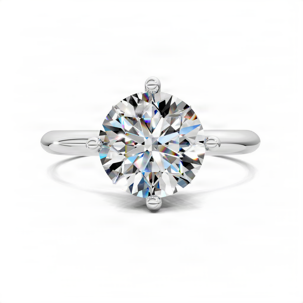 Platinum round solitaire engagement ring, top view with petal crown prongs