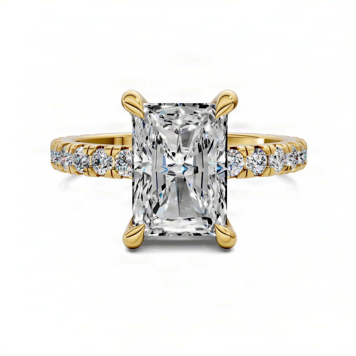Radiant-cut diamond accent ring in yellow gold with pavé side stones