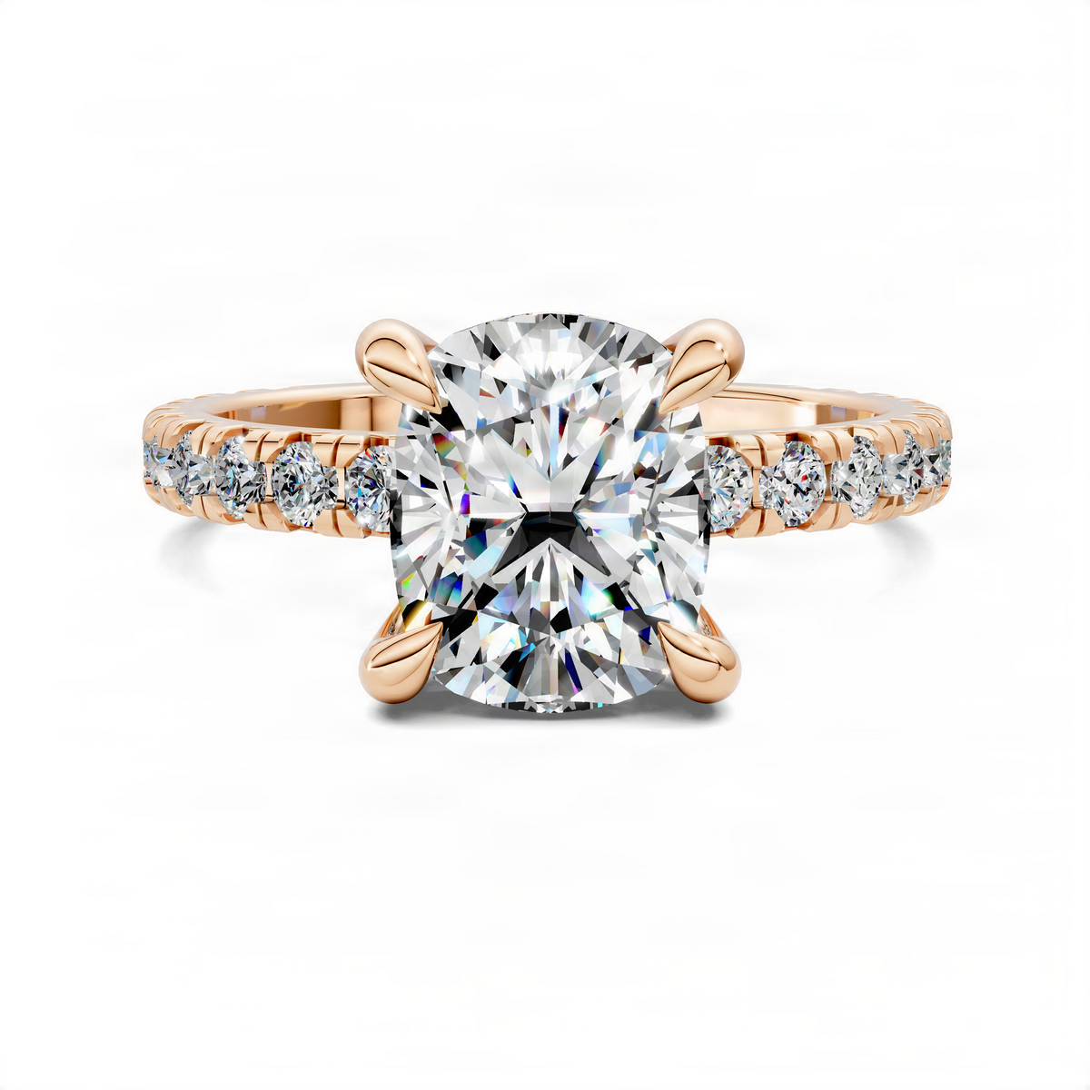 Rose gold cushion ring with large prong-set center stone and side diamond accents