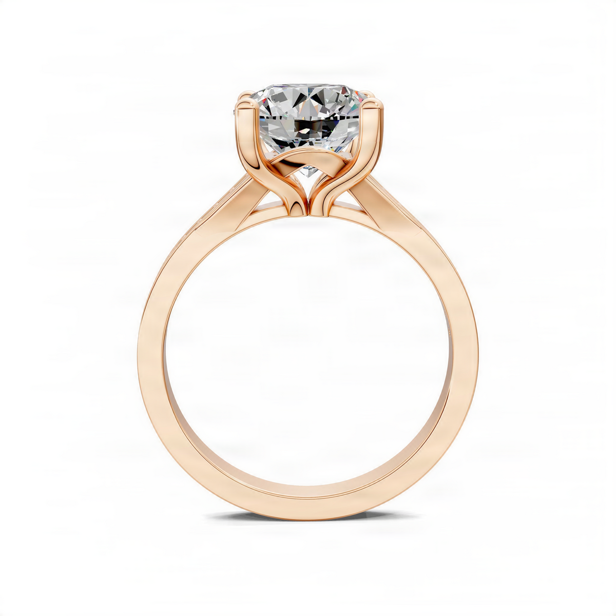 Round diamond engagement ring in rose gold with a raised cathedral setting