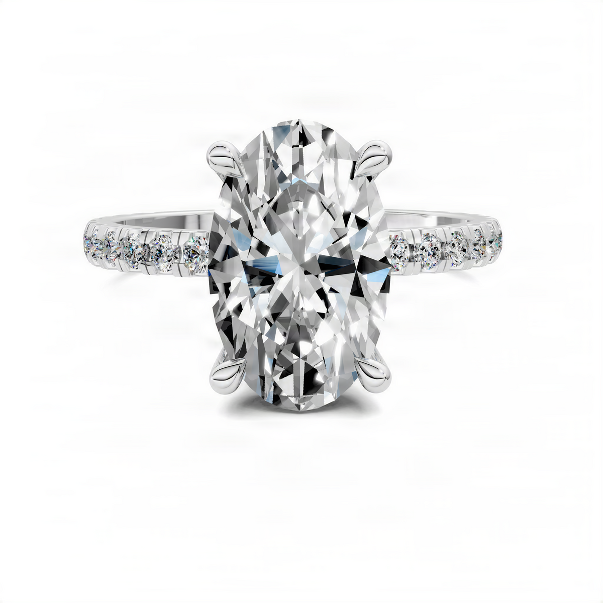 Oval-cut white metal ring with hidden halo and pavé band