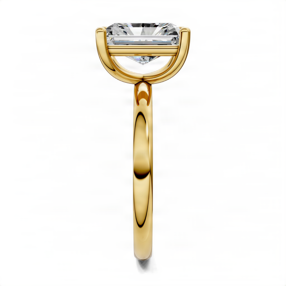 Yellow gold solitaire engagement ring with square-cut diamond in pronged setting
