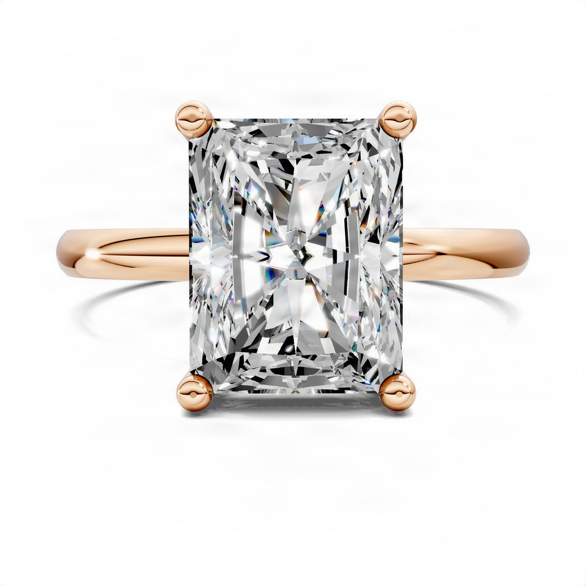 Rose gold solitaire engagement ring with large square-cut diamond and four round prongs