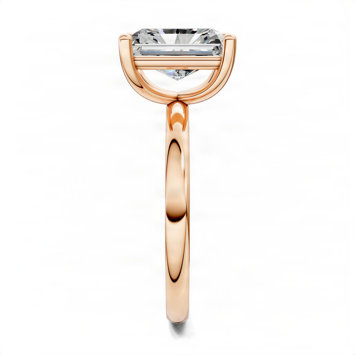 Rose gold solitaire engagement ring with square-cut diamond in pronged setting