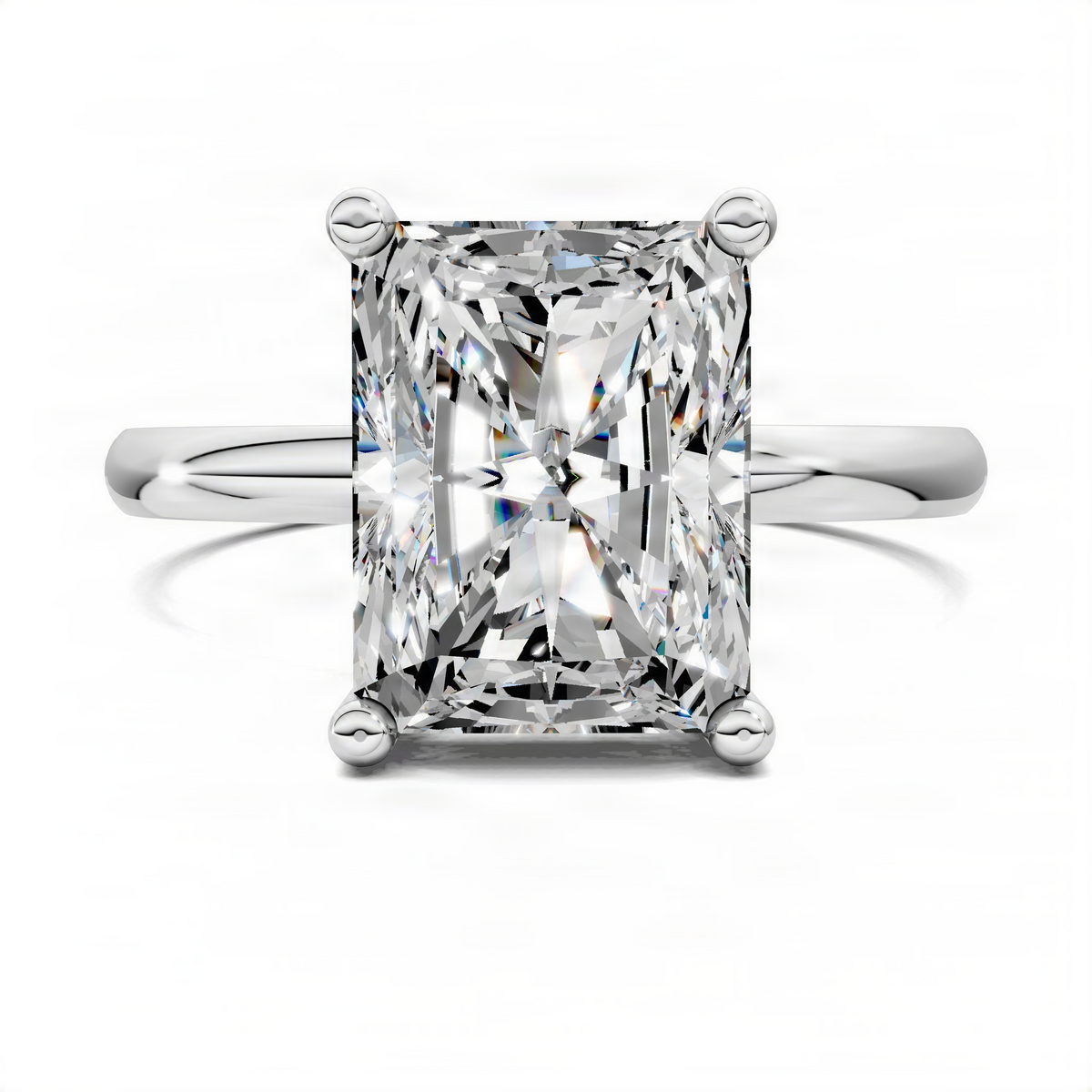 White gold solitaire engagement ring with large square-cut diamond and four ball prongs