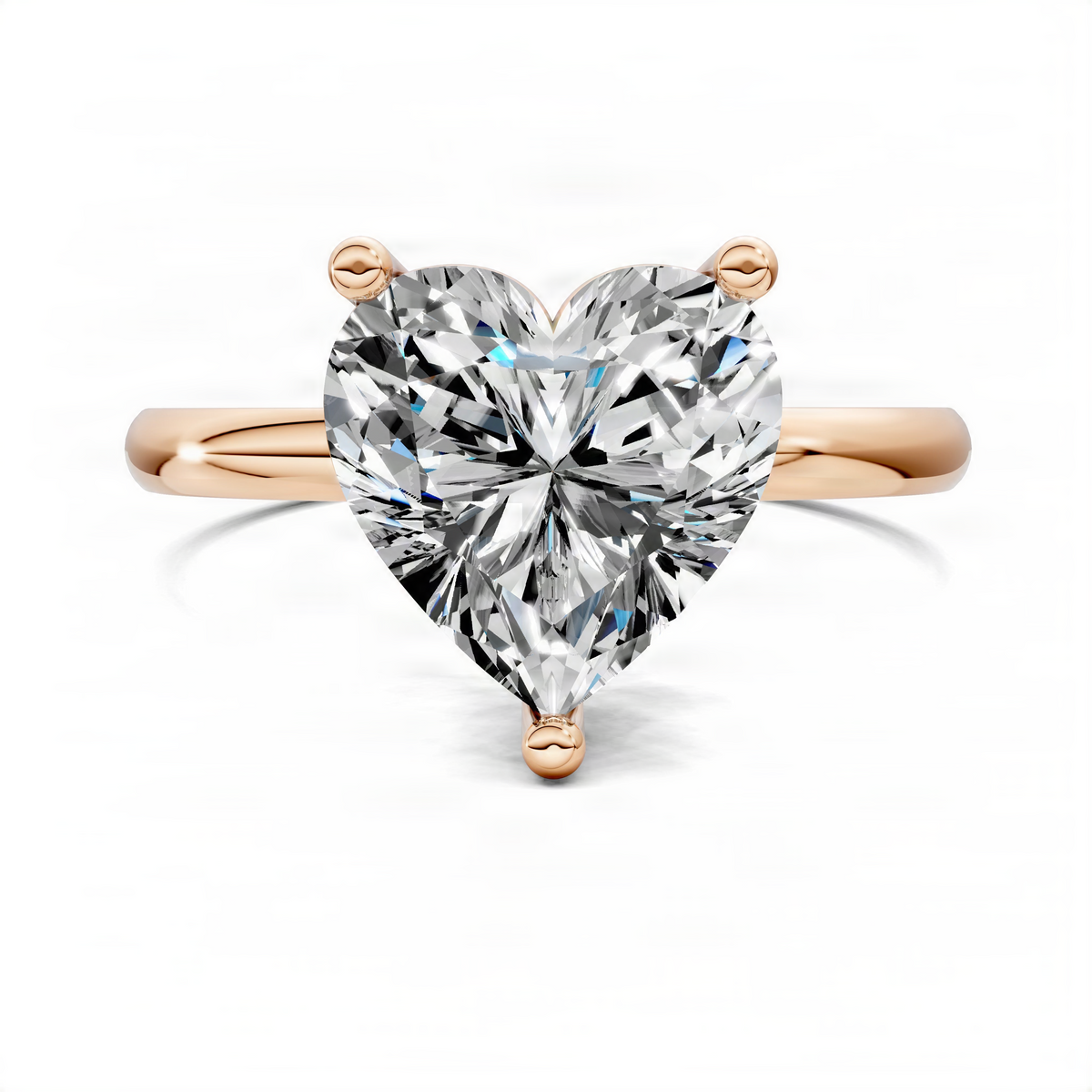 Heart-shaped solitaire engagement ring with rose-gold band and large clear center stone