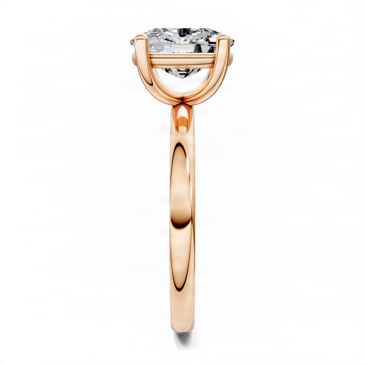 Rose gold solitaire engagement ring side view with round center diamond in prongs