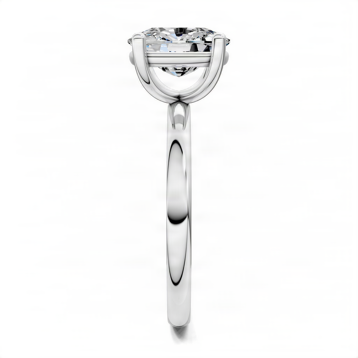 White gold solitaire engagement ring side view with round center diamond in prongs