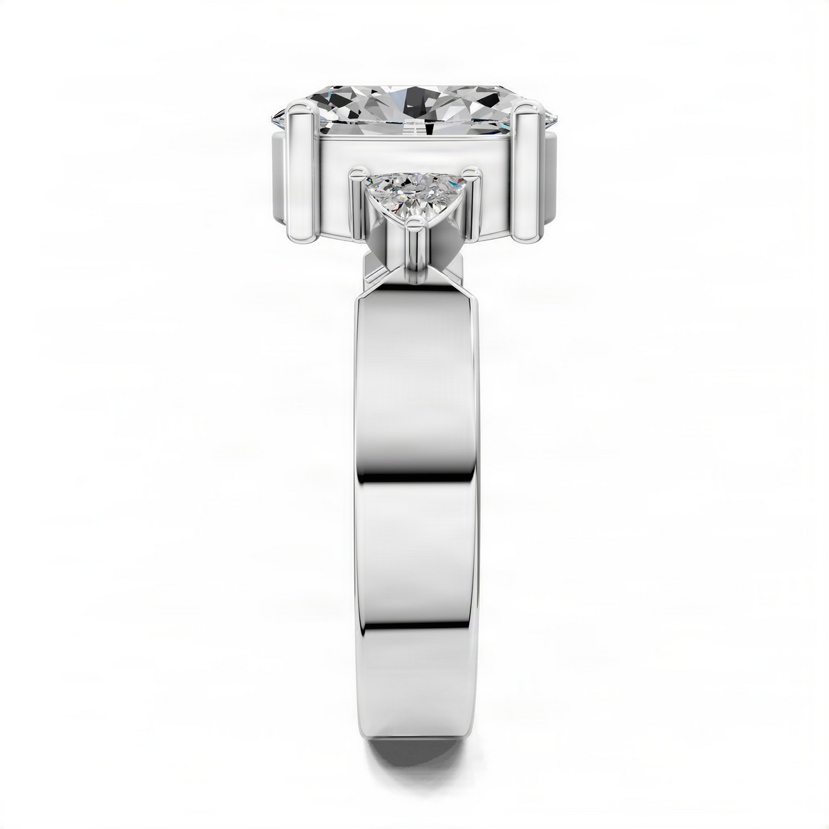 White gold engagement ring with prong-set center diamond and side stones
