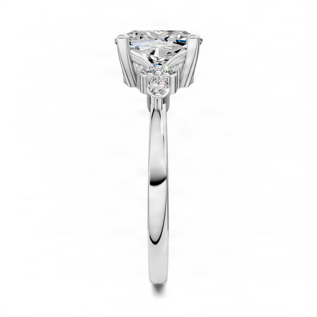 Platinum cushion diamond cluster ring with prong-set center stone and smooth band