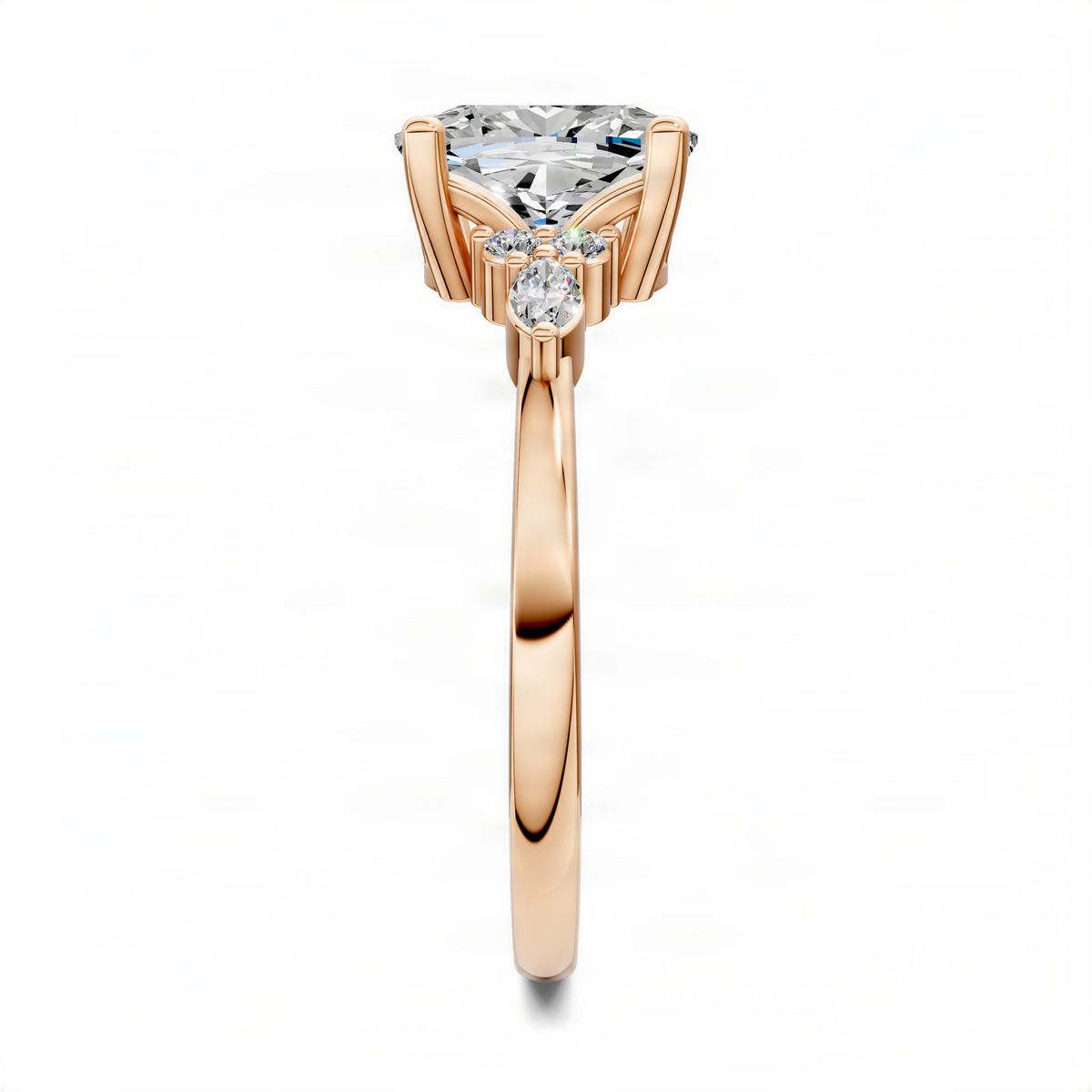 Rose gold cushion diamond cluster ring with small halo and side diamonds, slender band