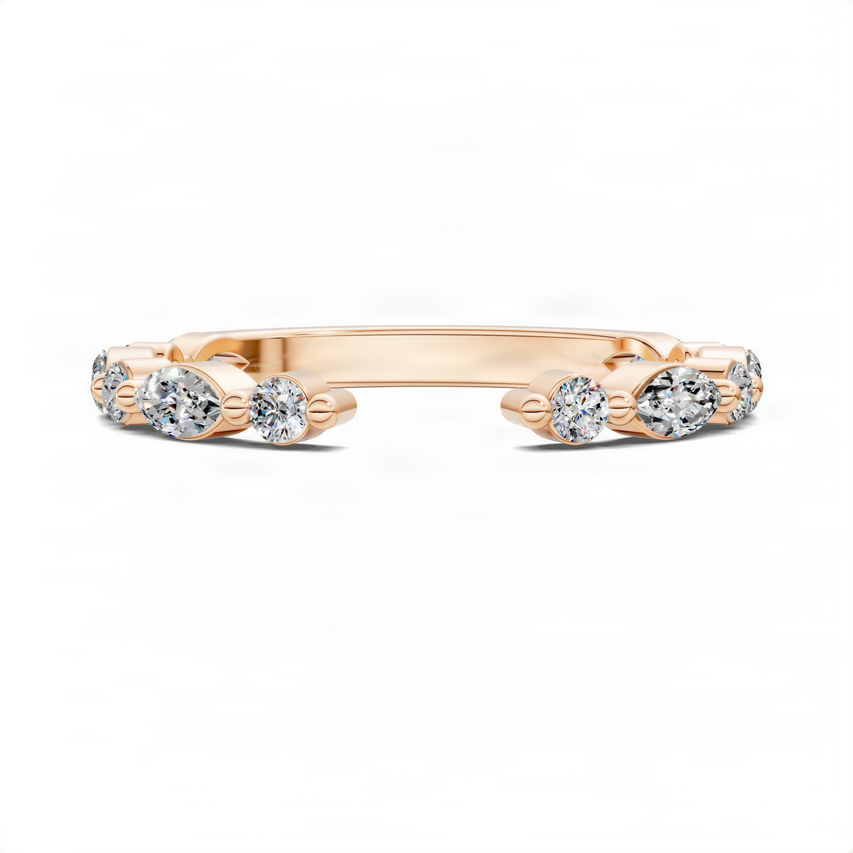 Rose gold open diamond ring with round and marquise stones across the center