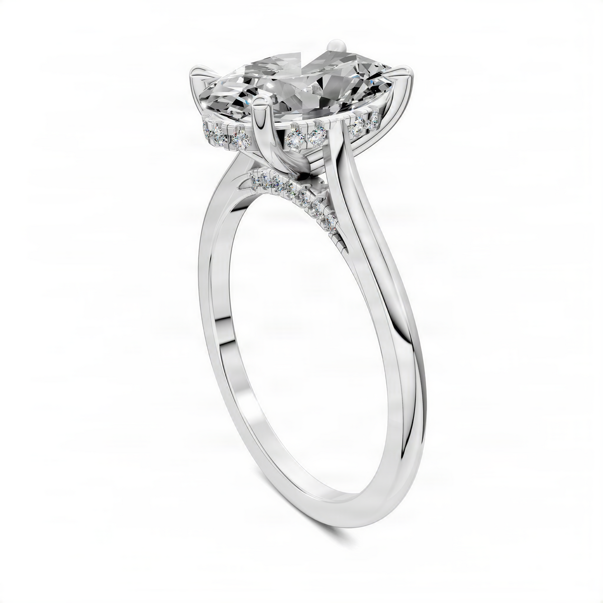 White gold ring with pavé bridge, hidden halo, and split shank