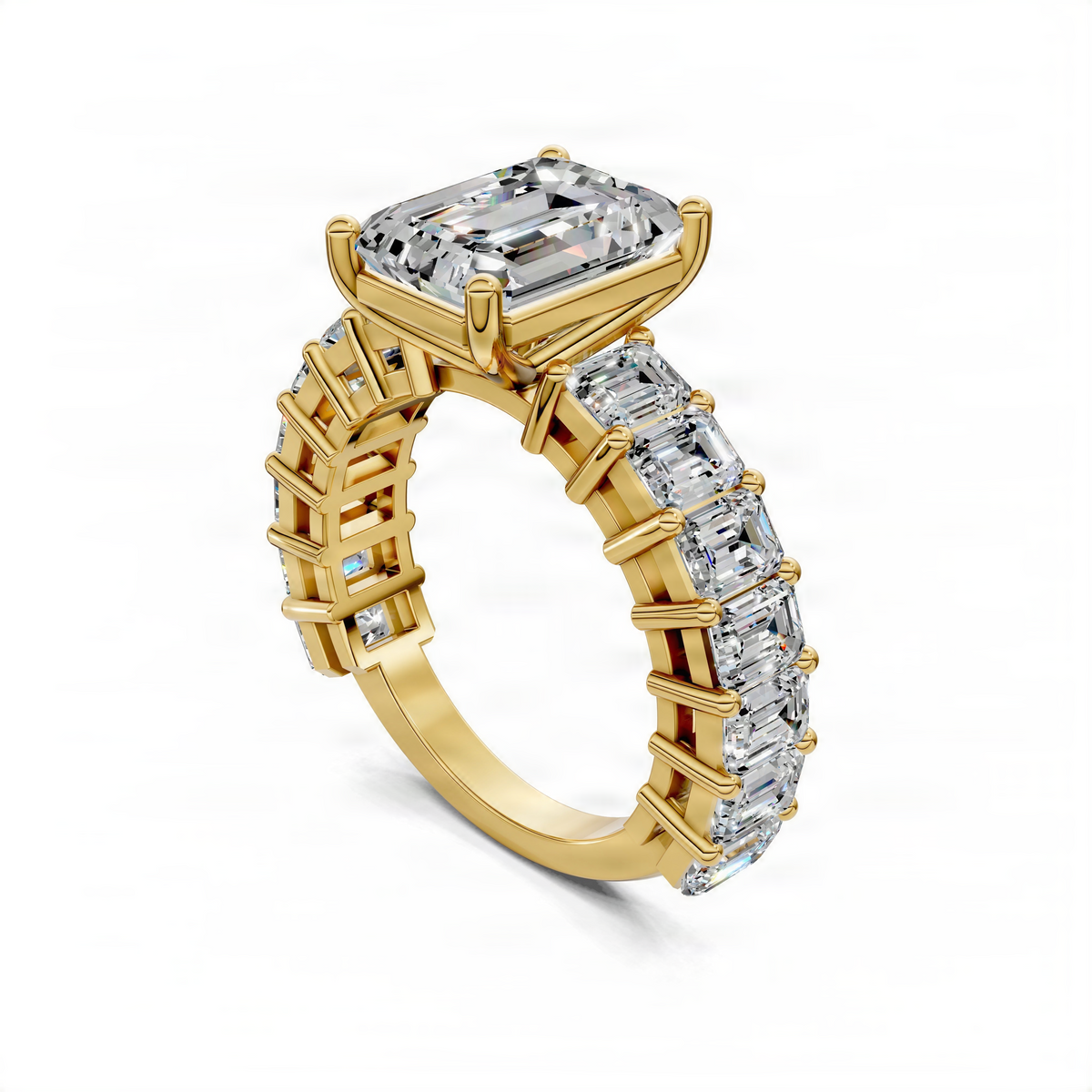Yellow gold engagement ring angled view with emerald-cut center and baguette pave band