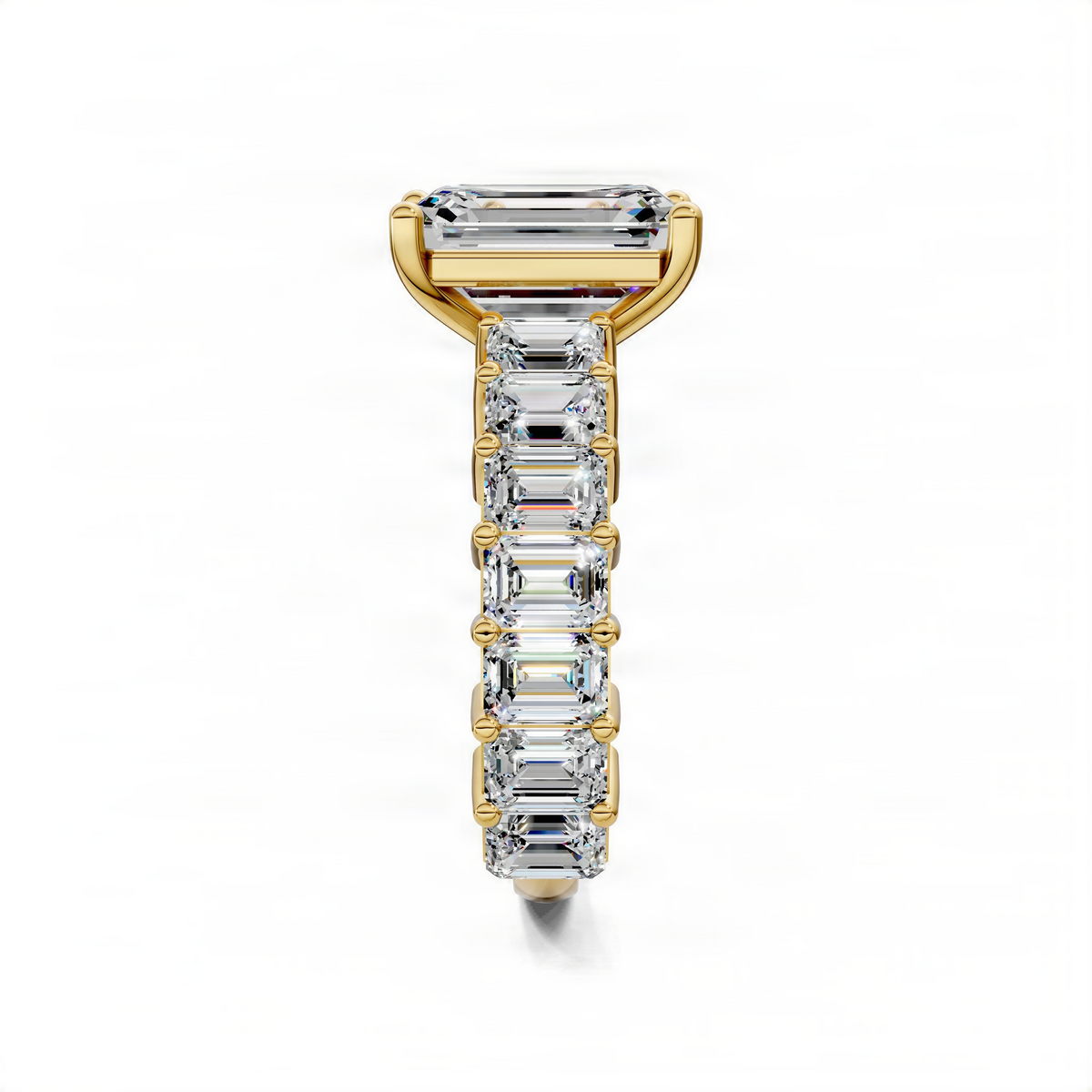 Yellow gold engagement ring with emerald-cut center stone and baguette pave gallery