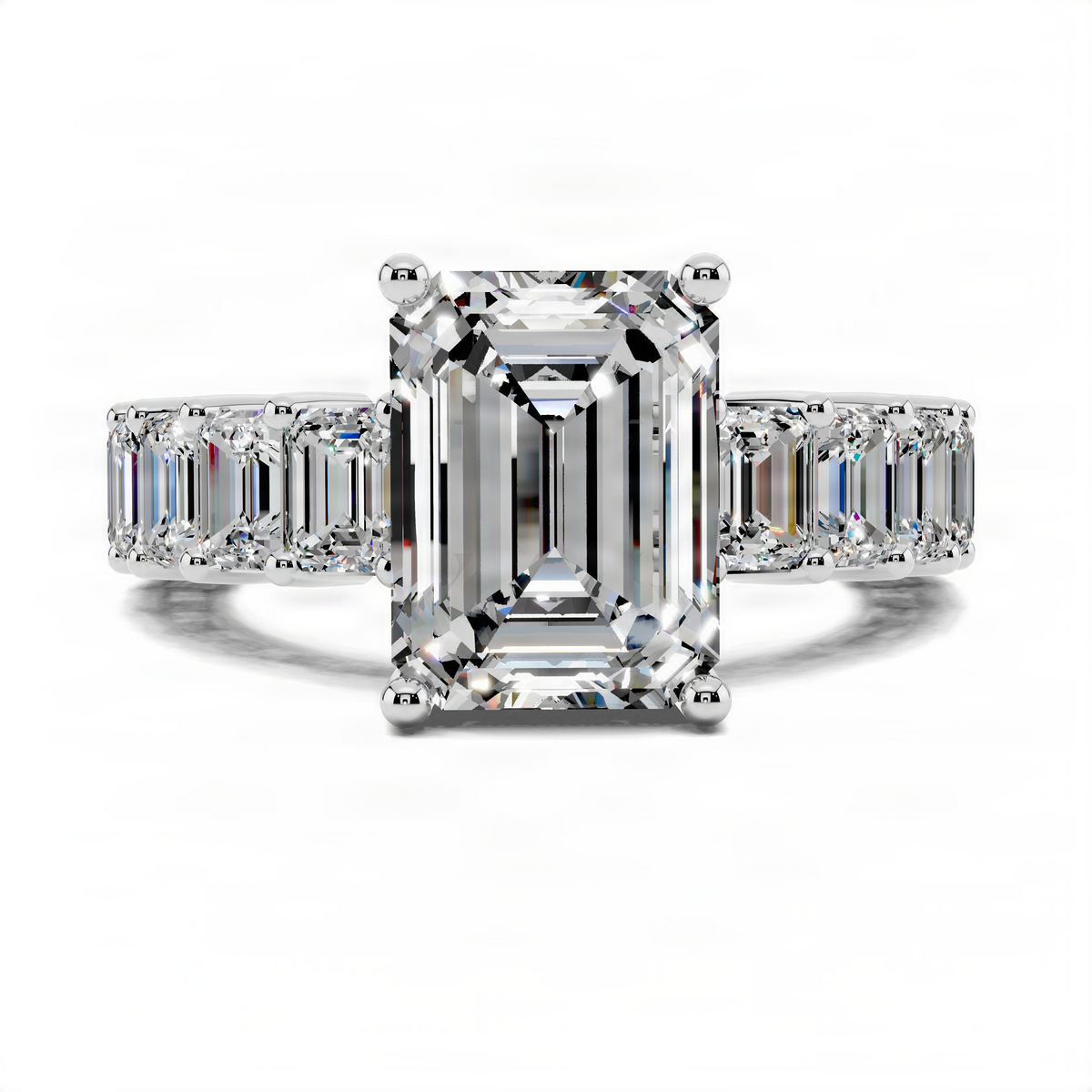 Platinum engagement ring with emerald-cut center and baguette pave band, front view