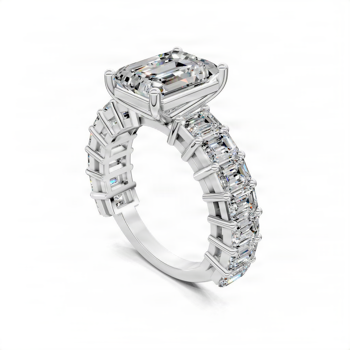 White-metal emerald-cut engagement ring with pave baguette band and prong setting